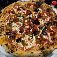 Harissa eggplant red pesto $31 w/vegan cheese +2: good harissa taste (bit spicy), good melty cheese, good crunchy garlic (but no taste). Soft base but nice bubbly crust. at Pizza Madre in Marrickville
