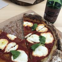 pizza marga and kombucha cold brew at Kucha in Ljubljana