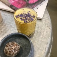 Turmeric latte and cinnamon ball at Echo in Margate