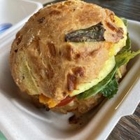 Herb & Cheddar Biscuit Breaky Sandwich with eggplant bacon. at Soulshine in San Diego