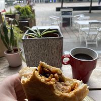 Link sausage and bacon breakfast roll   at The Glasvegan in Glasgow
