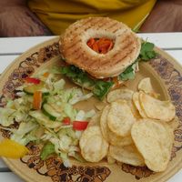 Salmon cream cheese bagel with salad and chips at The Glasvegan in Glasgow