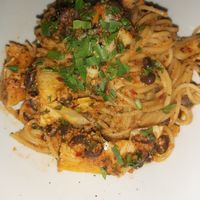Black bean and artichoke spaghetti with a little kick at Piva in New Westminster