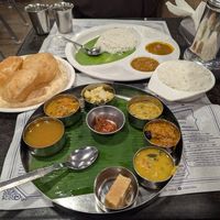 Thali (the brick desert isn't vegan, they took it back) string hopper style noodles at the back at Hotel Saravana Bhavan - Connaught Circus in New Delhi