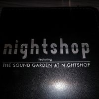 Logo at nightshop in Bloomington