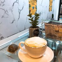 Matcha green tea latte and matcha energy ball  at Raw Vega in Bangkok