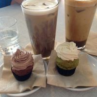 Vegan mini chocolate & matcha cupcakes, iced chai latte & coffee at Cafe Willi in Tubingen