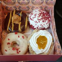 Peanut chocolade, red velvet cream cheese, white chocolate strawberry and mango cheesecake donut (and me, now diabetic) at Brammibal's Donuts - Prenzlauer Berg in Berlin