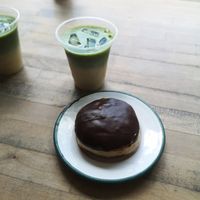Boston cream donut with iced matcha latte at Brammibal's Donuts - Prenzlauer Berg in Berlin