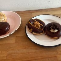 Right: almond, Boston cream
Left: peanut chocolate, cookie and cream at Brammibal's Donuts - Prenzlauer Berg in Berlin
