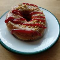 Peanut butter and jelly donut for breakfast. at Brammibal's Donuts - Prenzlauer Berg in Berlin