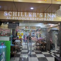 Signage at Al Firdous in Bangkok