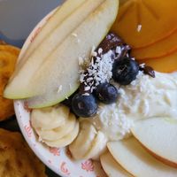 waffles, coconut yogurt with fruit at Bez Lukru in Wroclaw
