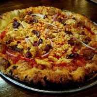 Pizza with vegan sausage and cashew cheese at Harvest Pizzeria in Clintonville