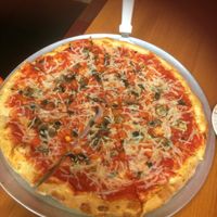 Large pizza, ask for extra vegan cheese at Cinelli's Pizza in Rochester