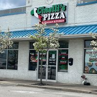 Outside located on the side of Tops  at Cinelli's Pizza in Rochester