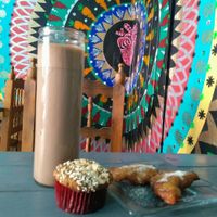 Licuado de plátano, empanadas de viento y panqué at Cafeteria Vegana Les Gords in Mexico City