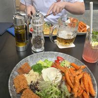 Vegan Buddha bowl (and goats cheese and ham omlette at back)   at Cafe Elektric in Prague