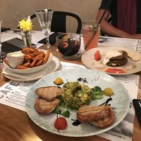 Sweet potato fries with hummus, matcha pancake and vegan avocado tartar.  at Cafe Elektric in Prague