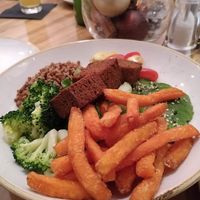 falafel and sweet potatoes fries salad! at Cafe Elektric in Prague