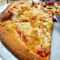 Vegan thin crust pizza with daiya cheese and caramelized onion at Pi Pizzeria - Downtown in St Louis