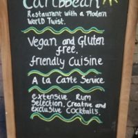 Outside board at Spiced Roots in Oxford