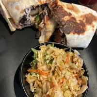 Vegan burrito w Brussels sprouts slaw. Luv the toasted burrito !  at Third Culture Kitchen in Titusville