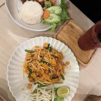 Vegan Pad Thai and Pad kra pao with fruit smoothies at At Home Cafe and Eatery in Bangkok