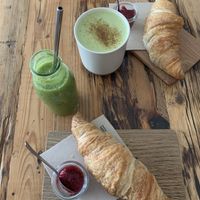 Croissants with jam, matcha latte and green smoothie   at Kaffee Ingwer in Berlin