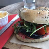Vegan 2 bagel - Roasted aubergine hummus beetroot chutney rocket & red pepper  at The Mule on Rouge in Berwick Upon Tweed