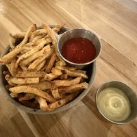 Fries with vegan wasabi mayo from sister restaurant across the street (Ptarmigan)  at Tundra Inn in Churchill