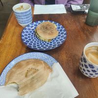 Jamaican pattie, English muffin & coffees at Kranky Cafe in Vancouver