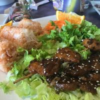 Delicious vegan grilled pork on a stick. Sweet and savory. The taste and texture is amazing! Highly recommend. at Sweet Lemon Vegan Bistro in Portland