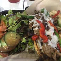 Philly cheese steak with salad  at The Modern Vegan in Las Vegas