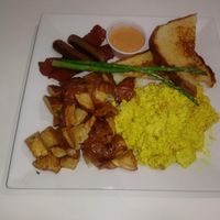 What Happens in Vegas: tofu scramble, breakfast potatoes, vegan bacon, vegan sausage, sourdough toast, asparagus (ordered October 2018). at The Modern Vegan in Las Vegas