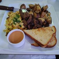 Steak & eggs. Potatoes were perfection! The steak needed that sauce & eggs weren't my fave . at The Modern Vegan in Las Vegas