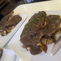 Biscuits and gravy, one with sausage, the other with chicken cutletts  at The Modern Vegan in Las Vegas