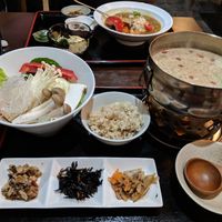 The soy milk hotpot in the foreground, curry in the background at Ren - Nakagyo Ward in Kyoto