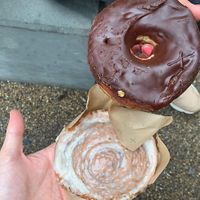 Vegan cinnamon bun and chocolate glazed doughnut   at Crosstown Doughnuts Vegan in London
