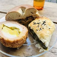 Scotch “egg”, bagel with tofu, “cream cheese” and kimchi, spanakopita   at Harmless in North London