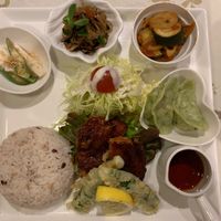 Meat in teriyaki sauce, vegetables tempura and dumplings at Aina Cafe in Osaka