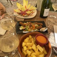 Hummus & fried potatoes w dip   at Canadu in Malaga