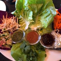 Got these lettuce wraps minus chicken and avoided the non vegan slaw.   Easy    at The Cheesecake Factory in Boise