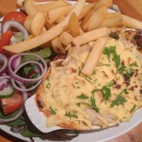 Vegan cheesy lasagna, chips and side salad (really tasty) at Charlie Brown's Diner in Eastbourne