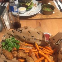 Vegan nuggets - the burger seen further away is not vegan at Orzo People Music Nature in Krakow