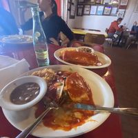 Half eaten veggie enchilada and veggie burrito   at Habanero's Fresh Mex in Las Cruces