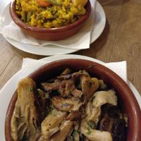 Sauteed mushrooms with smoked sea salt, vegan paella. at El Vegetariano de la Alcazabilla in Malaga