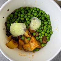 SuperBowl
A warm Asian styled poke bowl of jumbo white flower mushrooms, garbanzo, baby peas, quinoa, unpolished black, red & brown whole grain rice and roast potatoes tossed in s at EAT21 in Petaling Jaya