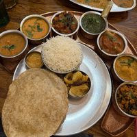 Talli selection of curries  at Herb Restaurant in Leicester