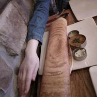 Masala dosa, genuinely the same length as my arm! at Herb Restaurant in Leicester